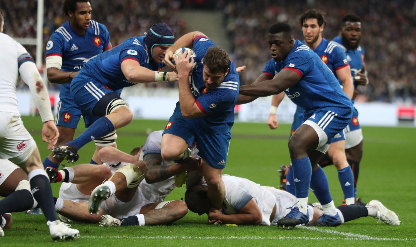 May treble inspires England to big France triumph May treble inspires England to big France triumph